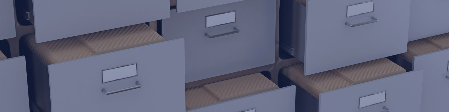 File cabinets open showing many folders